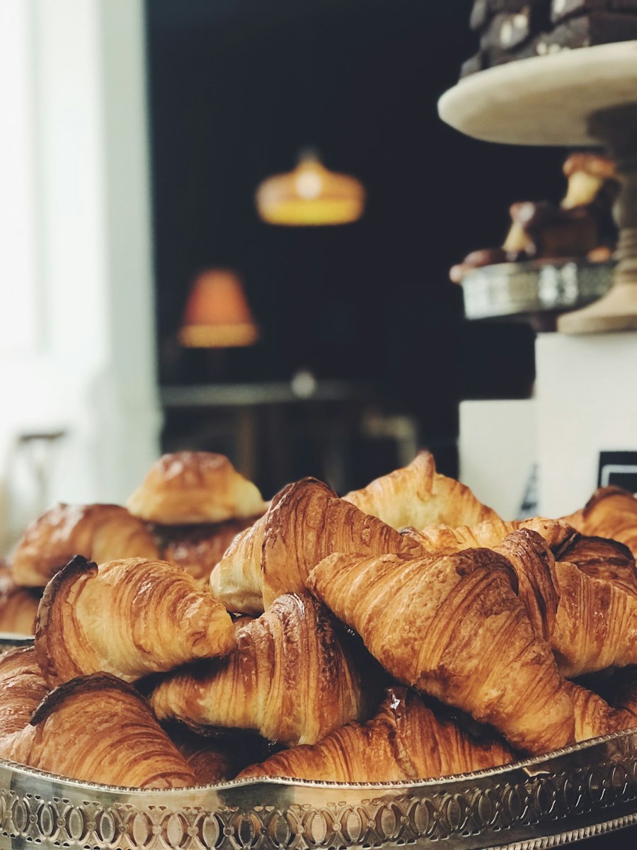 A tray of freshly baked golden butter croissants